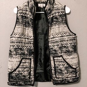 Black and white vest